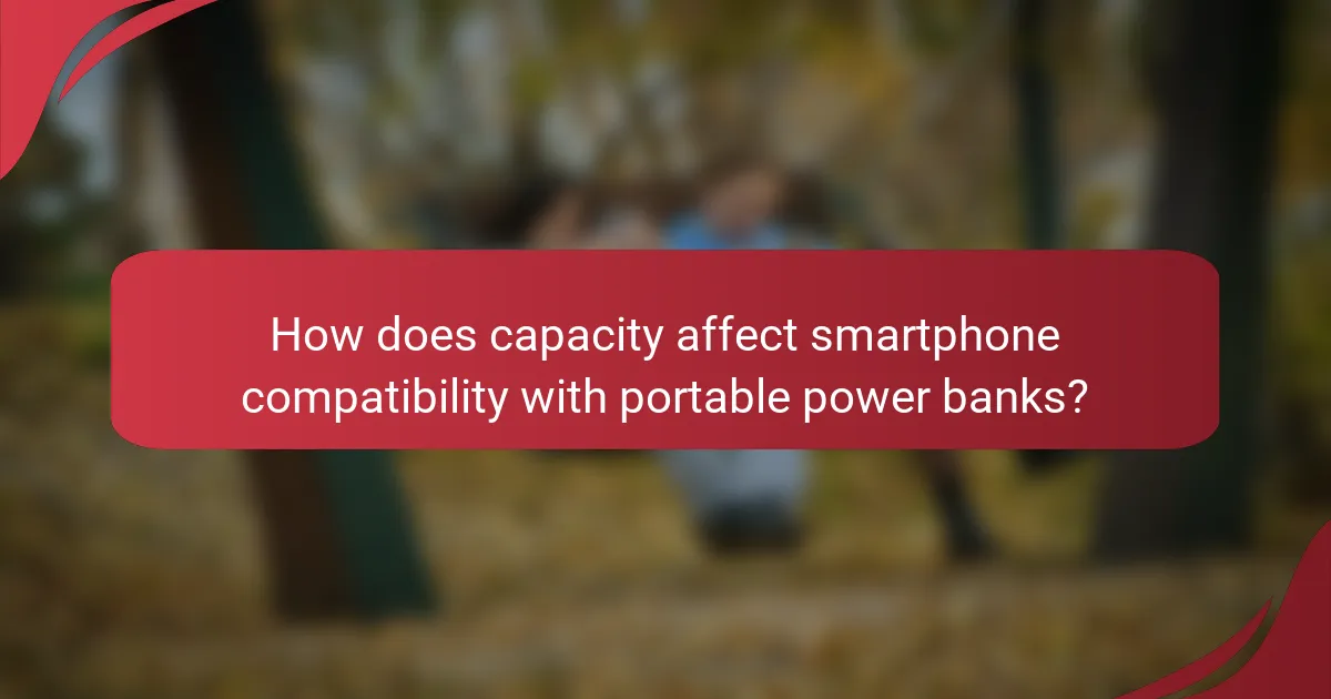 How does capacity affect smartphone compatibility with portable power banks?